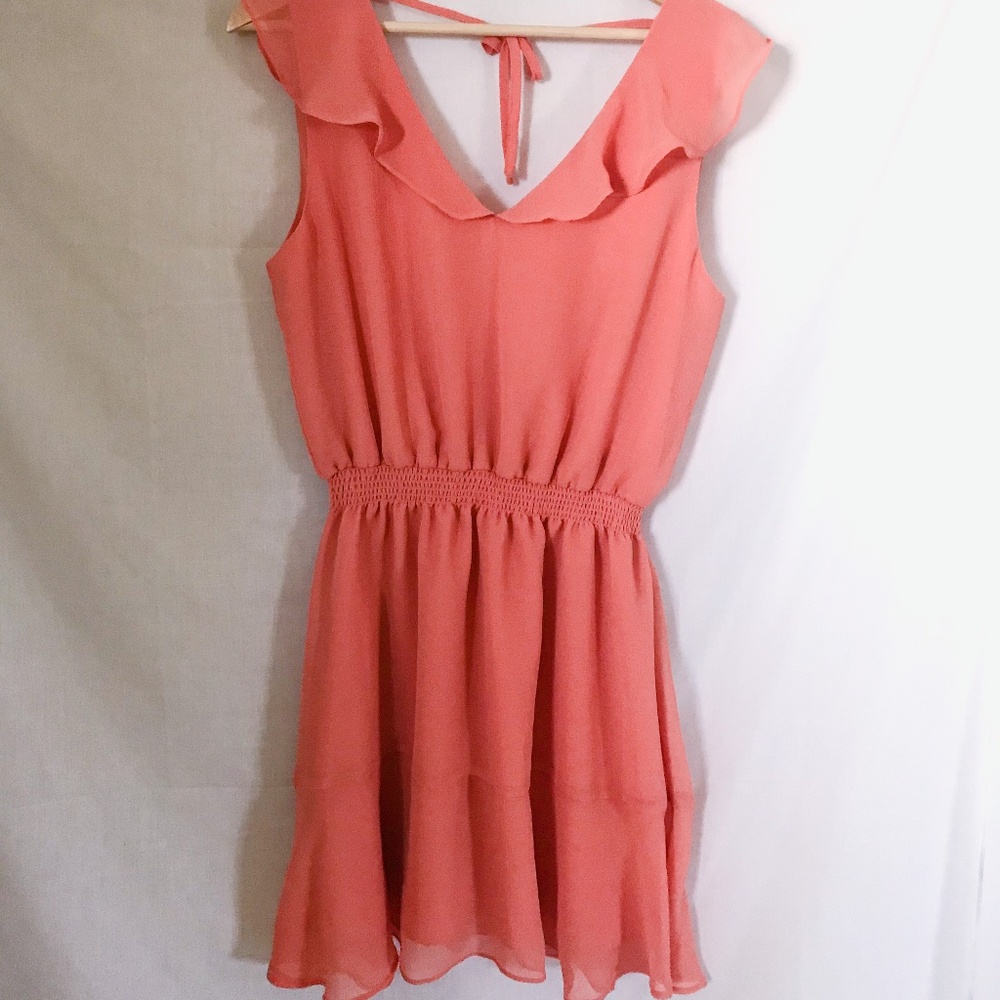 cupcakes & cashmere // salmon ruffle dress